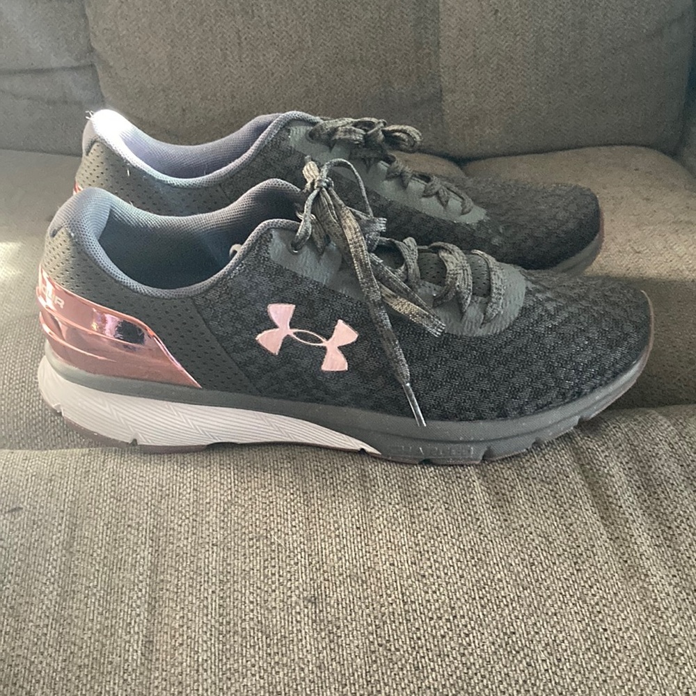 Pink and grey Under Armour shoes